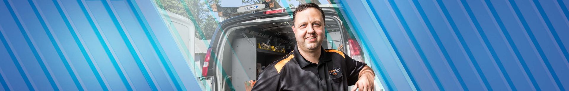 Technician smiling at camera