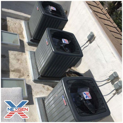 Three NexGen AC Units on top of a building.