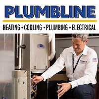 HVAC tech repairing a furnace in Erie, CO