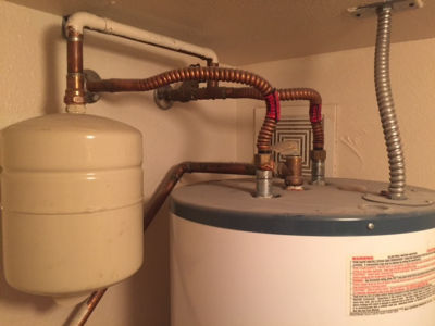Top of water heater tank inside closet