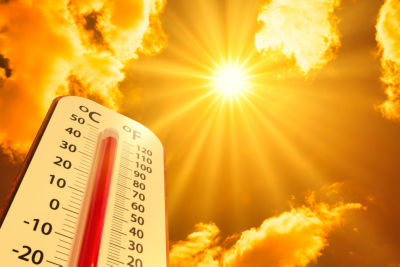 hot temperature,Thermometer on yellow sky with sun shining in summer show higher Weather, concept global warming