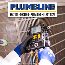 HVAC tech repairing an air conditioner at a home in Firestone, CO