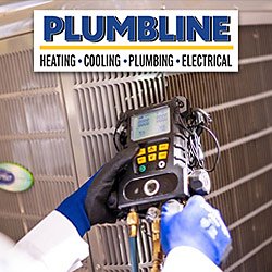 HVAC tech repairing an air conditioner at a home in Firestone, CO