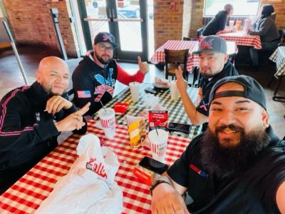 Four NexGen Techs eating lunch together.