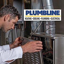 Plumbline tech repairing a furnace