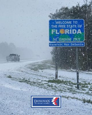 Welcome to the State of Florida sign in the snow with the Donovan logo