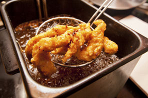 Frying chicken in cooking oil
