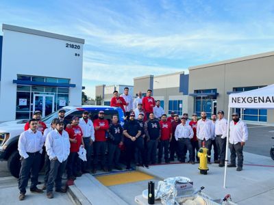 NexGen Technicians standing in front of work truck