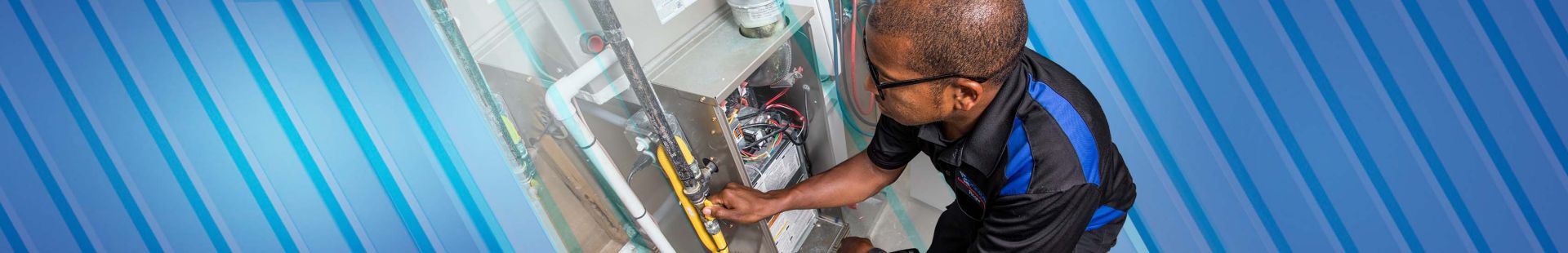 Man working on furnace unit