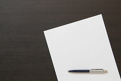 Pen and Paper with a black background