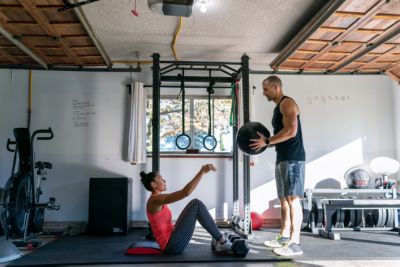 People working out in their garage gym