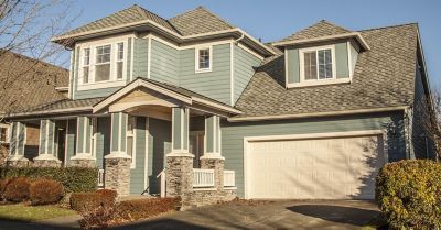 Grey house with brown roof