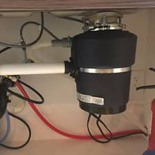Garbage disposal beneath sink