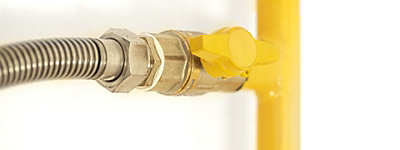 A yellow pipe with a valve
