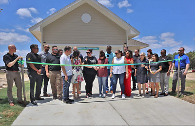 Habitat for Humanity 10th Ribbon Cutting with Abacus Houston
