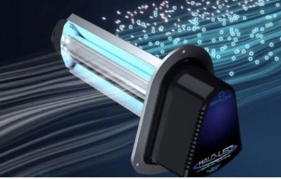 A UV purifier light with air particles going through it.