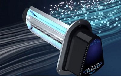 A UV purifier light with air particles going through it.