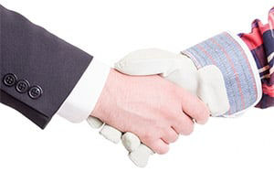 Two people shaking hands.