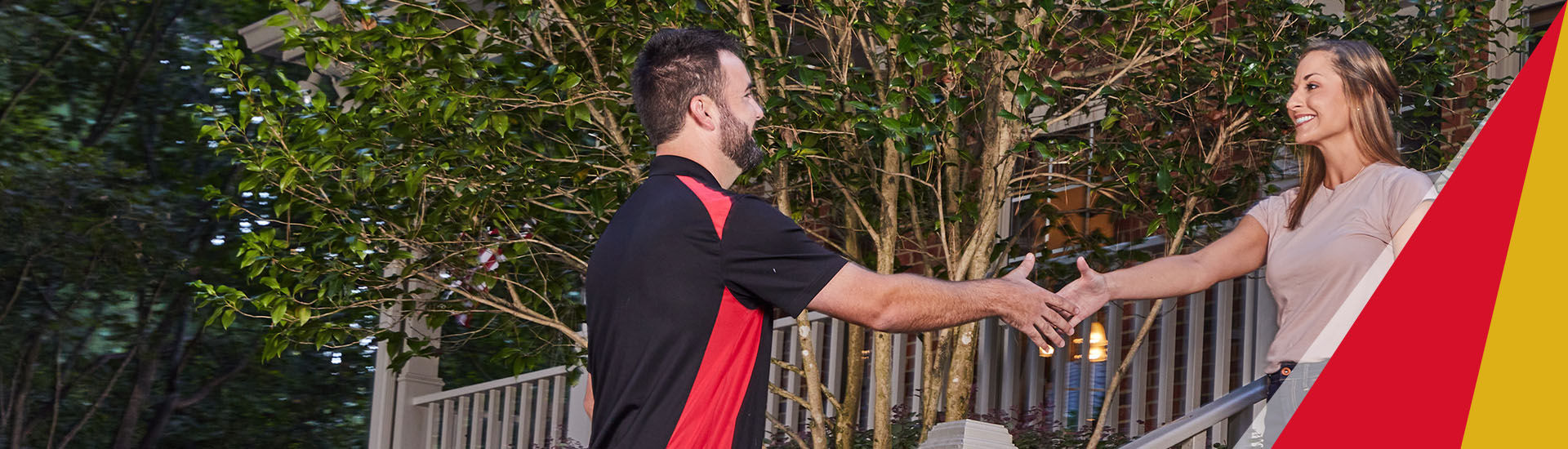 Ragsdale technician shaking hands with customer