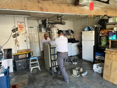 NexGen Employees working together to move HVAC