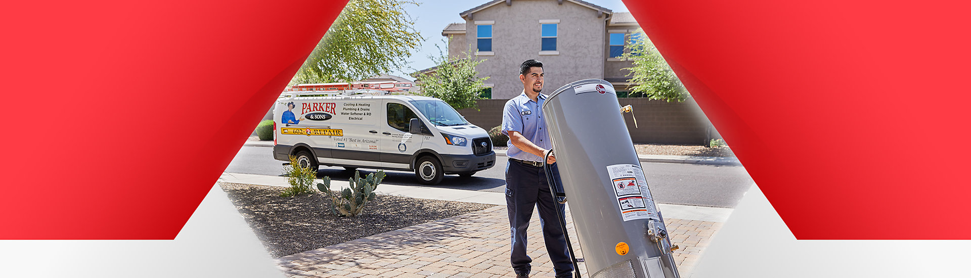 Plumber from Parker & Sons installing a water heater in Tempe