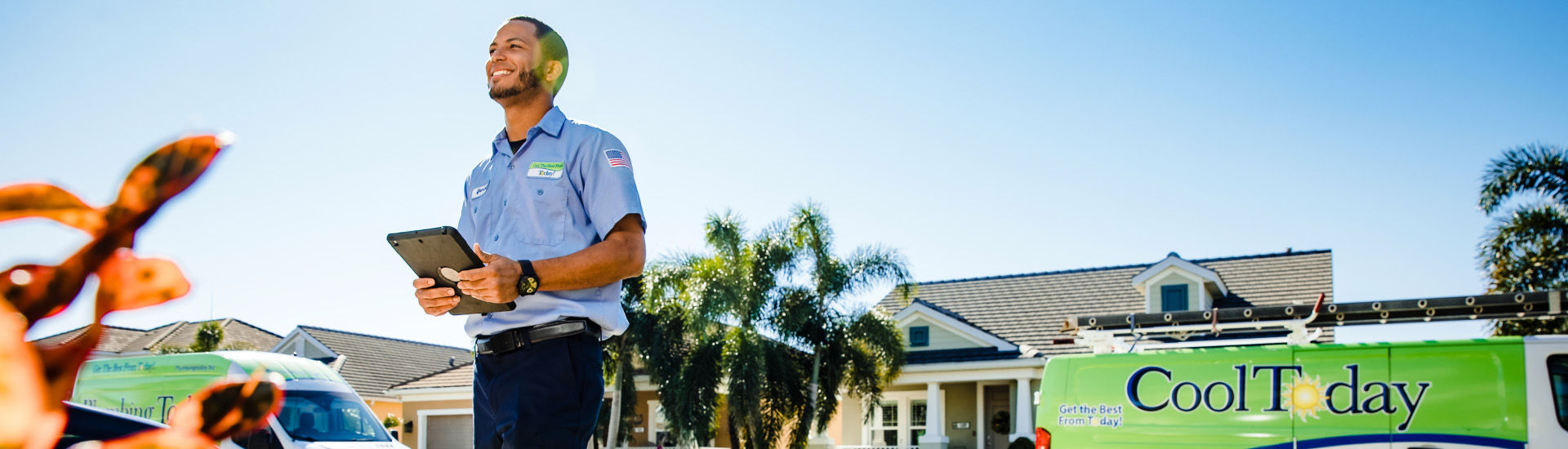 Electrician from Energy Today waving at an Orlando homeowner