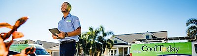 Plumbing Today plumbers in front of a service van in Riverview, Florida