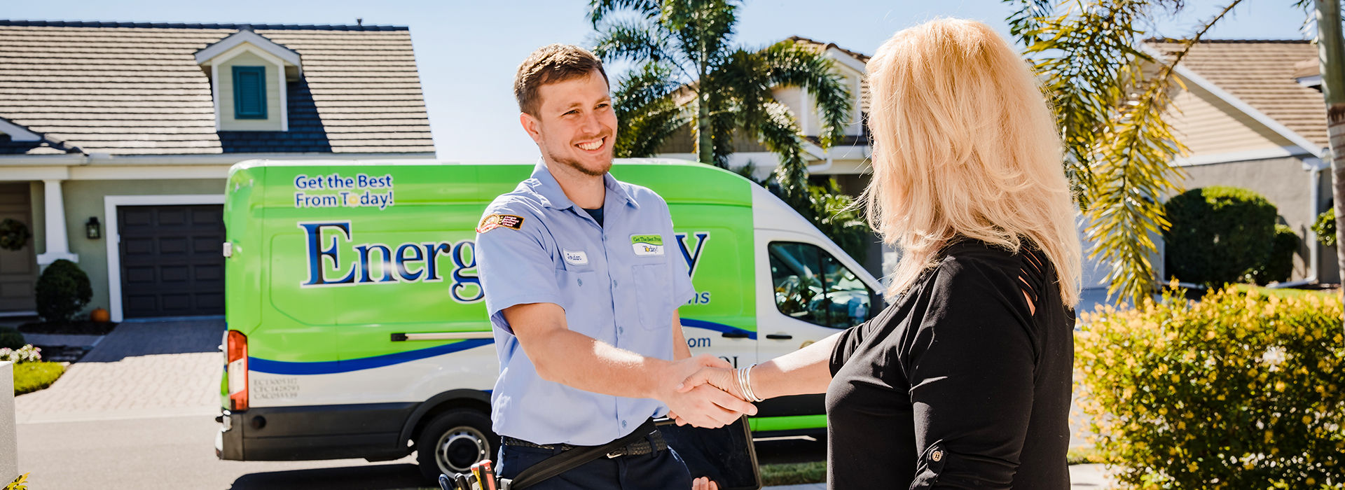 Smiling tech greeting woman