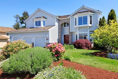 Image of the outside of a house in the summertime