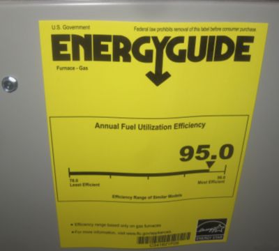 Yellow energy guide sticker on outside of furnace