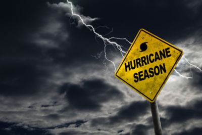 Dark stormy sky with a hurricane season sign