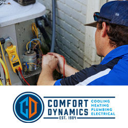 Comfort Dynamics HVAC tech repairing a system