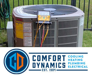 Comfort Dynamics HVAC tech repairing a system