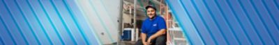 Smiling Coolray HVAC technician