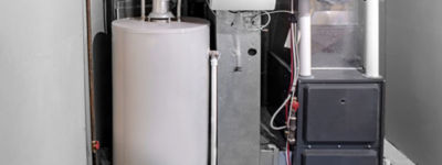 A home high efficiency furnace with a residential gas water heater & humidifier.