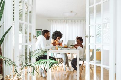 Family sitting at a dining table