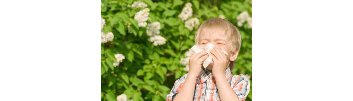 Boy sneezing