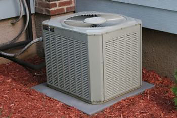 Air conditioning unit outside of house
