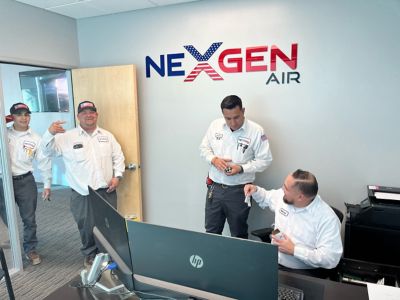 4 NexGen techs in a office