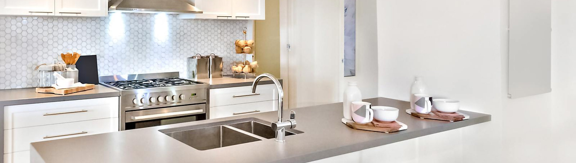 Modern white kitchen with island countertop