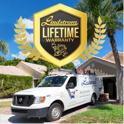 van in driveway with lifetime warranty gold crest