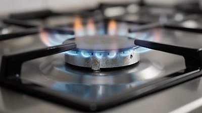 A lit stove burner