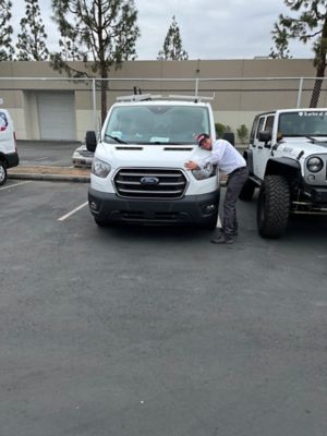 NexGen Employee hugging van