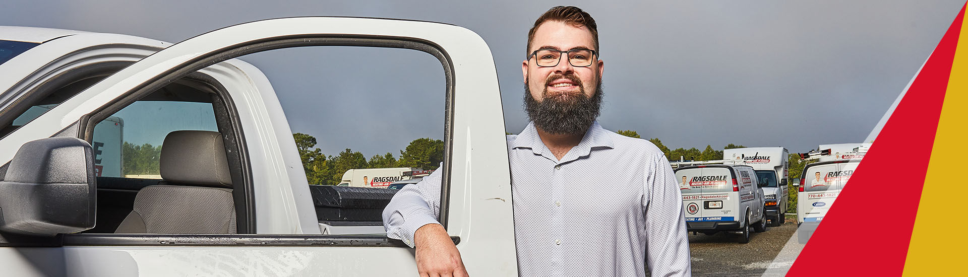 Ragsdale employee standing next to truck