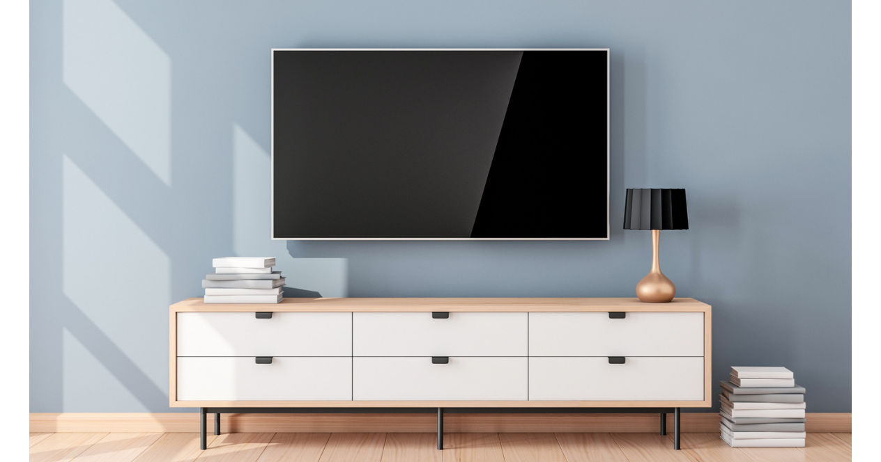 Modern living room with flat screen mounted on blue wall