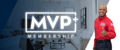 A smiling man giving a thumbs up for MVP+ Membership in a living room setting.