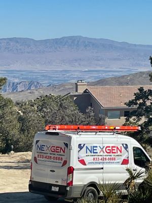 NexGen Van with mountains in the background