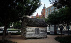  replica of John Neely Bryan Cabin is pictured in Founders Plaza on Elm Street in downtown Dallas