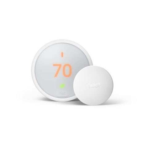 A Nest Thermostat with the number 70 degrees displayed on it.