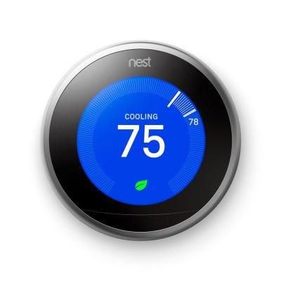 Nest learning thermostat showing 75 degrees on screen